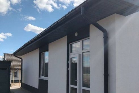 На Київщині зводять нові будинки для родин, які втратили житло через війну: фото