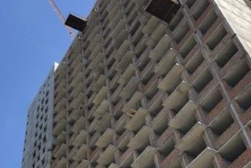 Щоб допомогти &laquo;Київміськбуду&raquo;, КМДА викупить у компанії житло для пільговиків, школи і садочки