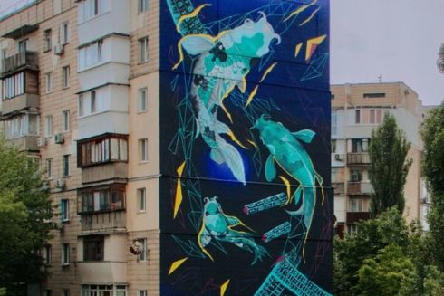 На Деміївці з'явився 20-метровий мурал з японськими рибами та кіберпросторовим океаном