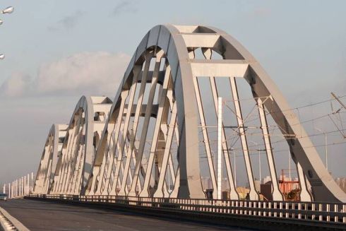 Фото. На Дарницком мосту возобновили строительство съездов