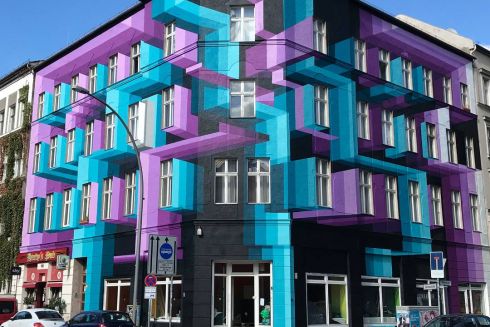 Фото дня: вуличний художник оживляє фасади тривимірними зображеннями