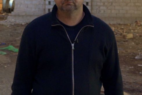 Фермер из Киевской области навел огонь на собственный склад, где базировались оккупанты. Теперь собирают деньги на его восстановление